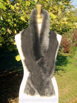 Suede Side of the 52 inch Grey Brisa Toscana Shearling Scarf